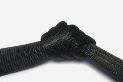 Tubular bånd svart/polyester 25mm pr.m.